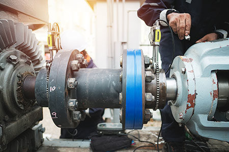 pump expert performing Texas pump repair on booster pump