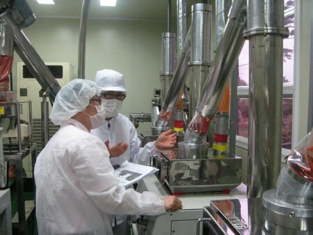 People in food processing plant that needs Texas pump repair