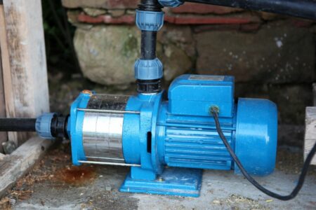 Blue solvent pump that needs Texas industrial pump repair.