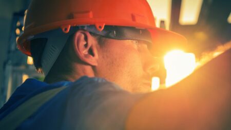 Close up of technician conducting Texas industrial pump repair